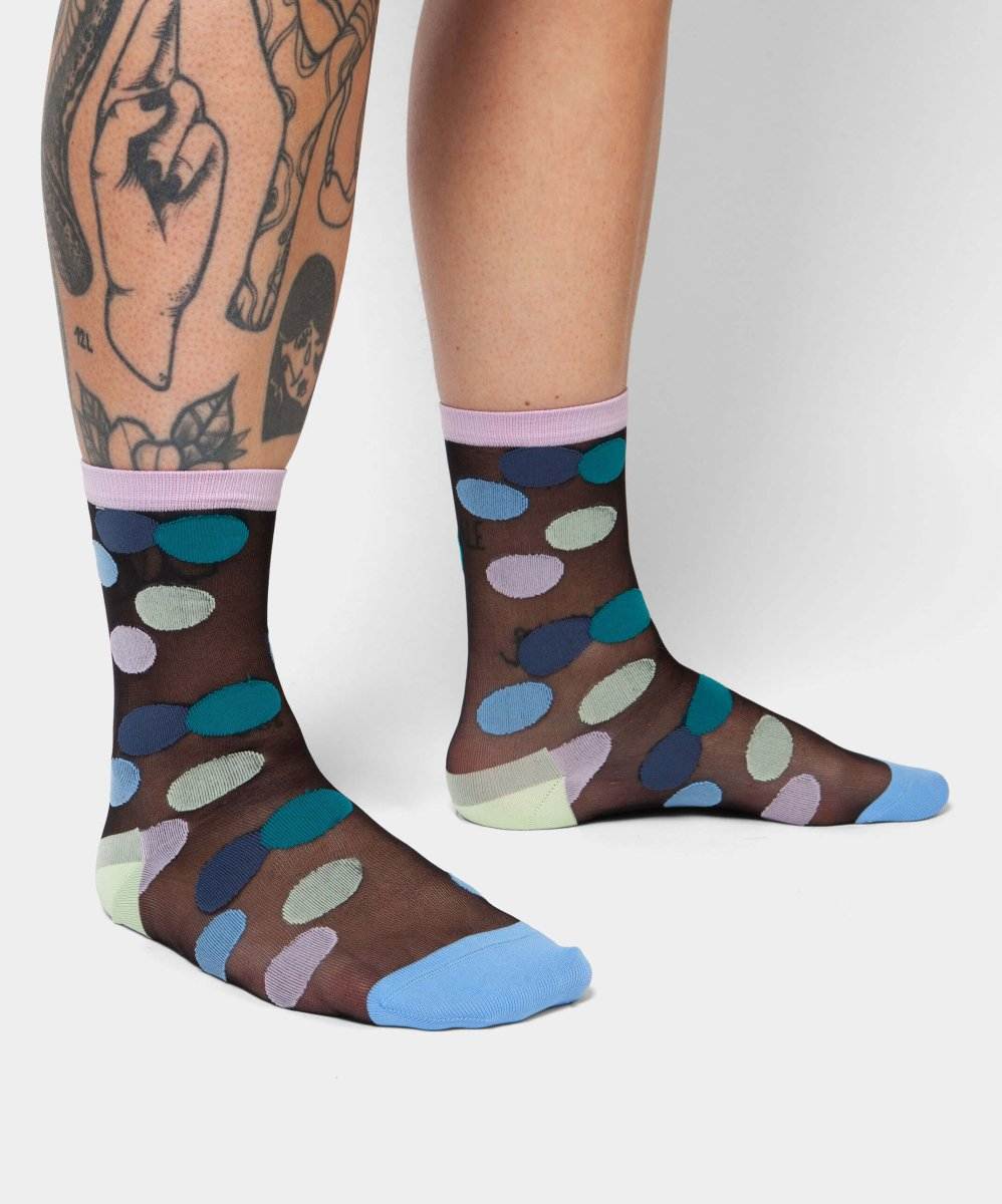 Schlafende Seifenblasen auf farbigen Socken Sleeping Soap Bubbles