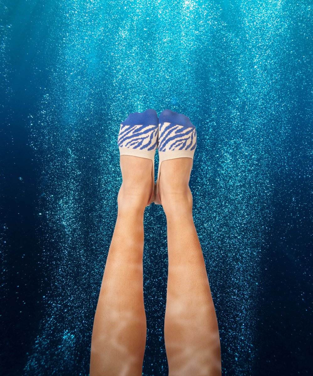 Verborgene Tiger Queen in auffälligen Socken für Fortgeschrittene